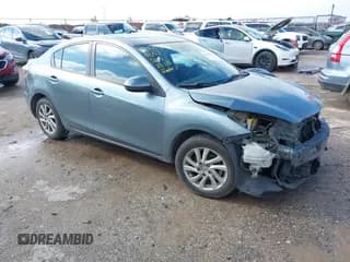 ✅ 2012 Mazda 3 i Touring • VIN: JM1BL1V78C1640306 • Lot: 41440907. Listed on IAAI with 134,428 mi. Free auction sales archive from the USA and detailed vehicle history report at DreamBid. Image 1.