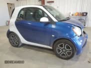 ✅ 2016 Smart fortwo Prime • VIN: WMEFJ5DA9GK053514 • Lot: 61554565. Wystawiony na Copart z przebiegiem 85 779 mil. Bezpłatny archiwum sprzedaży aukcyjnych z USA i szczegółowy raport historii pojazdu na DreamBid. Zdjęcie 4.