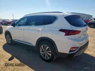 ✅ 2019 Hyundai Santa Fe SEL Plus • VIN: 5NMS33AD8KH064017 • Лот: 81822165. Опубликован ранее на Copart с пробегом 70 412 миль. Бесплатный доступ к архиву аукционных продаж из США и подробный отчёт об истории автомобиля на DreamBid. Изображение 2.