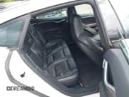 ✅ 2015 Tesla Model S 85D • VIN: 5YJSA1H41FF082379 • Lot: 42321001. Listed on IAAI with 109,465 mi. Free auction sales archive from the USA and detailed vehicle history report at DreamBid. Image 8.