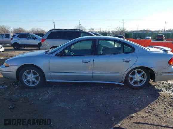 ✅ 2004 Oldsmobile Alero GL1 • VIN: 1G3NL52E94C189058 • Lot: 41224615. Wystawiony na IAAI z przebiegiem 208 921 mil. Bezpłatny archiwum sprzedaży aukcyjnych z USA i szczegółowy raport historii pojazdu na DreamBid. Zdjęcie 14.