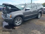 ✅ 2011 Chevrolet Suburban LTZ • VIN: 1GNSKKE38BR169495 • Lot: 43372468. Listed on IAAI with 119,937 mi. Free auction sales archive from the USA and detailed vehicle history report at DreamBid. Image 2.