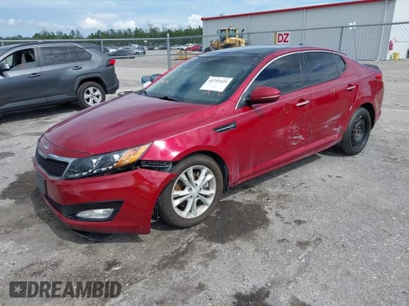 ✅ 2012 Kia Optima EX • VIN: 5XXGN4A62CG013765 • Lot: 42753425. Listed on IAAI with 114,141 mi. Free auction sales archive from the USA and detailed vehicle history report at DreamBid. Image 2.