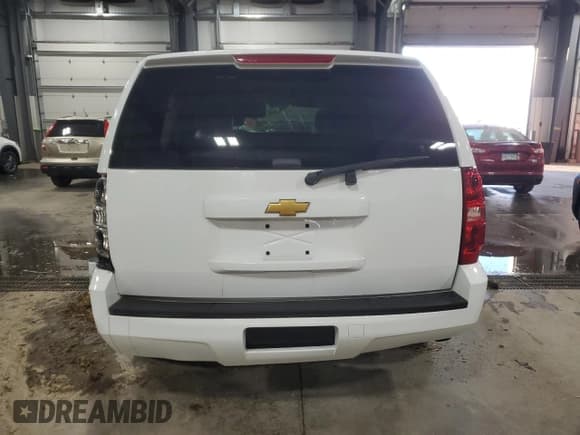 ✅ 2014 Chevrolet Tahoe Commercial • VIN: 1GNLC2E00ER167400 • Lot: 82217174. Listed on Copart with 136,376 mi. Free auction sales archive from the USA and detailed vehicle history report at DreamBid. Image 6.