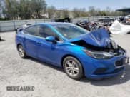 ✅ 2016 Chevrolet Cruze LT • VIN: 1G1BE5SM8G7243671 • Lot: 49928133. Listed on Copart with 64,383 mi. Free auction sales archive from the USA and detailed vehicle history report at DreamBid. Image 4.