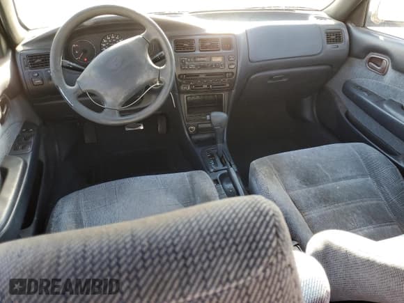 ✅ 1996 Toyota Corolla DX • VIN: 1NXBB02E6TZ363505 • Lot: 72077025. Wystawiony na Copart z przebiegiem 236 432 mil. Bezpłatny archiwum sprzedaży aukcyjnych z USA i szczegółowy raport historii pojazdu na DreamBid. Zdjęcie 8.