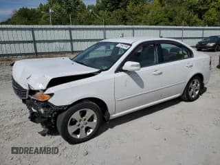 ✅ 2009 Kia Optima LX • VIN: KNAGE228695309998 • Лот: 71542794. Опубликован ранее на Copart с пробегом 92 744 миль. Бесплатный доступ к архиву аукционных продаж из США и подробный отчёт об истории автомобиля на DreamBid. Изображение 1.