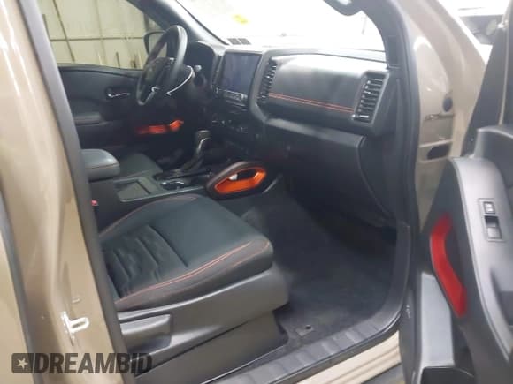 ✅ 2024 Nissan Frontier SV • VIN: 1N6ED1EK8RN613989 • Lot: 42310148. Listed on IAAI with 14,202 mi. Free auction sales archive from the USA and detailed vehicle history report at DreamBid. Image 5.