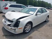 ✅ 2005 Cadillac STS • VIN: 1G6DW677750149070 • Lot: 42422968. Listed on IAAI with 193,387 mi. Free auction sales archive from the USA and detailed vehicle history report at DreamBid. Image 2.