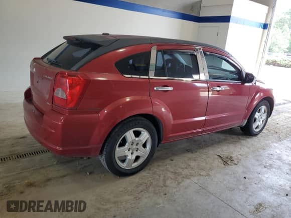 2009 Dodge Caliber SXT с VIN 1B3HB48A09D180024, выставлен на аукционе Copart как лот 66963824 с пробегом 142 314 миль миль и Чистый • Clean title. История ставок и продаж доступна на DreamBid. Изображение 3.