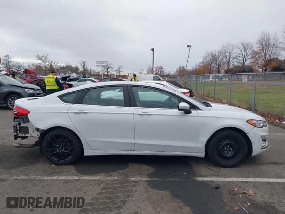 ✅ 2020 Ford Fusion SE • VIN: 3FA6P0HD8LR121625 • Lot: 43602476. Listed on IAAI with 75,925 mi. Free auction sales archive from the USA and detailed vehicle history report at DreamBid. Image 13.