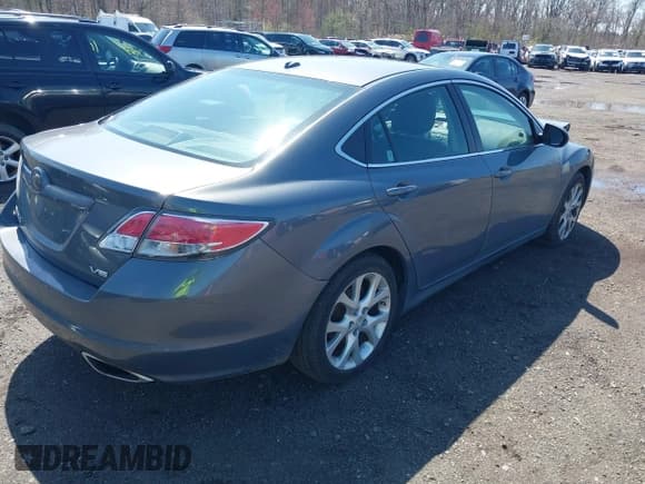 ✅ 2009 Mazda 6 S Grand Touring • VIN: 1YVHP82B795M01762 • Lot: 41925269. Listed on IAAI with 163,967 mi. Free auction sales archive from the USA and detailed vehicle history report at DreamBid. Image 4.