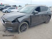 ✅ 2021 Mazda CX-5 Touring • VIN: JM3KFBCM5M0362002 • Lot: 43632624. Wystawiony na IAAI z przebiegiem 76 380 mil. Bezpłatny archiwum sprzedaży aukcyjnych z USA i szczegółowy raport historii pojazdu na DreamBid. Zdjęcie 17.