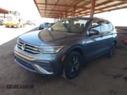 ✅ 2023 Volkswagen Tiguan SE • VIN: 3VVNB7AX1PM117728 • Lot: 42673251. Listed on IAAI with 27,915 mi. Free auction sales archive from the USA and detailed vehicle history report at DreamBid. Image 2.