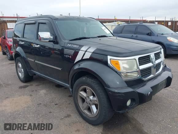 2008 Dodge Nitro SLT z VIN 1D8GU58K88W238520, wystawiony jako IAAI lot #43610184 z przebiegiem 122 628 mil mil oraz . Historia ofert i sprzedaży dostępna na DreamBid. Obrazek 1.