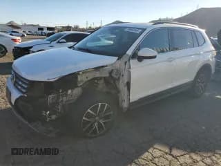 ✅ 2018 Volkswagen Tiguan SEL • VIN: 3VV3B7AX2JM214581 • Lot: 90683545. Wystawiony na Copart z przebiegiem 97 979 mil. Bezpłatny archiwum sprzedaży aukcyjnych z USA i szczegółowy raport historii pojazdu na DreamBid. Zdjęcie 1.