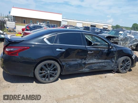 ✅ 2017 Nissan Altima S • VIN: 1N4AL3AP9HN341894 • Lot: 43011504. Listed on IAAI with 112,872 mi. Free auction sales archive from the USA and detailed vehicle history report at DreamBid. Image 14.