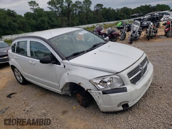 2011 Dodge Caliber Mainstreet z VIN 1B3CB3HA7BD268448, wystawiony jako Copart lot #73742484 z przebiegiem 176 439 mil mil oraz Szkoda całkowita • Salvage title. Historia ofert i sprzedaży dostępna na DreamBid. Obrazek 4.