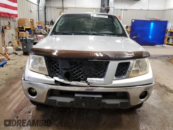 ✅ 2009 Nissan Frontier SE • VIN: 1N6AD07W59C402480 • Lot: 86842535. Listed on Copart with 120,925 mi. Free auction sales archive from the USA and detailed vehicle history report at DreamBid. Image 5.