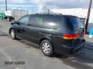 ✅ 2004 Honda Odyssey EX-L • VIN: 5FNRL18074B076928 • Lot: 43709130. Listed on IAAI with 206,633 mi. Free auction sales archive from the USA and detailed vehicle history report at DreamBid. Image 3.