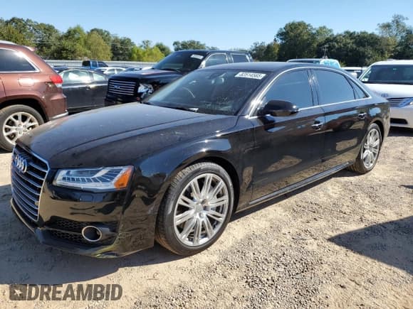 ✅ 2018 Audi A8 • VIN: WAU44AFDXJN000630 • Лот: 82514565. Опубликован ранее на Copart с пробегом 56 976 миль. Бесплатный доступ к архиву аукционных продаж из США и подробный отчёт об истории автомобиля на DreamBid. Изображение 1.