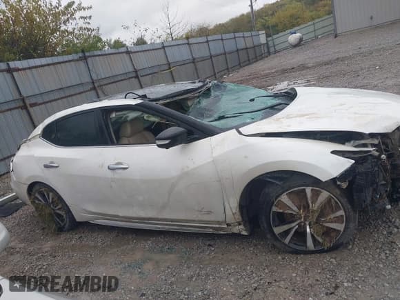 ✅ 2016 Nissan Maxima Platinum • VIN: 1N4AA6AP9GC404915 • Lot: 43574957. Wystawiony na IAAI z przebiegiem 134 725 mil. Bezpłatny archiwum sprzedaży aukcyjnych z USA i szczegółowy raport historii pojazdu na DreamBid. Zdjęcie 13.