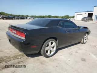 2012 Dodge Challenger SXT z VIN 2C3CDYAG4CH118276, wystawiony jako Copart lot #70877304 z przebiegiem 118 691 mil mil oraz Szkoda całkowita • Salvage title. Historia ofert i sprzedaży dostępna na DreamBid. Obrazek 3.