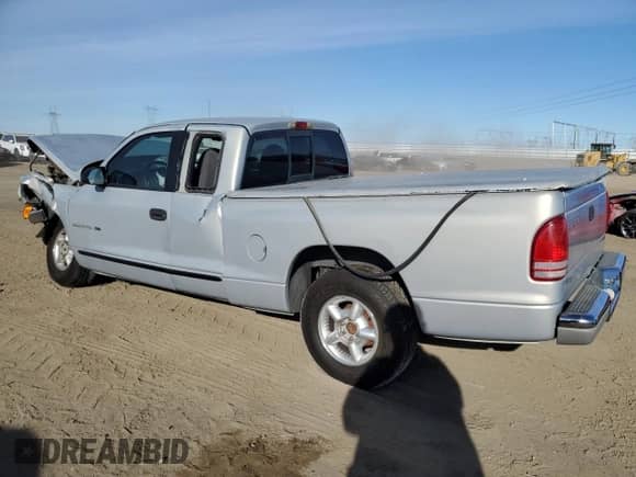 1998 Dodge Dakota SLT z VIN 1B7GL22Y6WS549252, wystawiony jako Copart lot #86925244 z przebiegiem 246 913 mil mil oraz Szkoda całkowita • Salvage title. Historia ofert i sprzedaży dostępna na DreamBid. Obrazek 2.