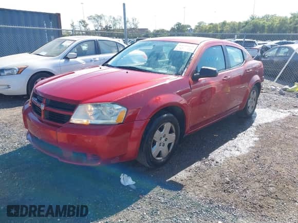 ✅ 2010 Dodge Avenger SXT • VIN: 1B3CC4FB3AN199006 • Lot: 43531630. Listed on IAAI with 212,591 mi. Free auction sales archive from the USA and detailed vehicle history report at DreamBid. Image 2.