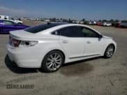 ✅ 2013 Hyundai Azera • VIN: KMHFH4JG9DA209562 • Лот: 59808655. Опубликован ранее на Copart с пробегом 130 994 миль. Бесплатный доступ к архиву аукционных продаж из США и подробный отчёт об истории автомобиля на DreamBid. Изображение 3.