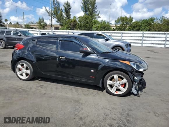 ✅ 2014 Hyundai Veloster • VIN: KMHTC6AD0EU215740 • Lot: 44886525. Wystawiony na Copart z przebiegiem 118 913 mil. Bezpłatny archiwum sprzedaży aukcyjnych z USA i szczegółowy raport historii pojazdu na DreamBid. Zdjęcie 4.