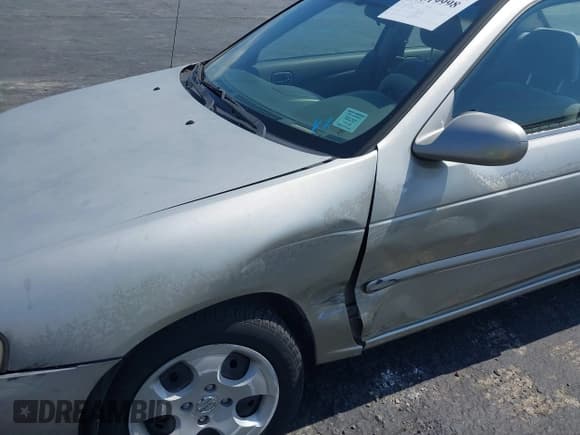 ✅ 2003 Nissan Sentra GXE • VIN: 3N1CB51D53L777242 • Lot: 43319998. Wystawiony na IAAI z przebiegiem 74 041 mil. Bezpłatny archiwum sprzedaży aukcyjnych z USA i szczegółowy raport historii pojazdu na DreamBid. Zdjęcie 6.