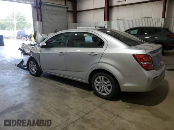 2017 Chevrolet Sonic LS с VIN 1G1JB5SH2H4123651, выставлен на аукционе Copart как лот 82694485 с пробегом Не указан миль и Списание • Salvage title. История ставок и продаж доступна на DreamBid. Изображение 2.