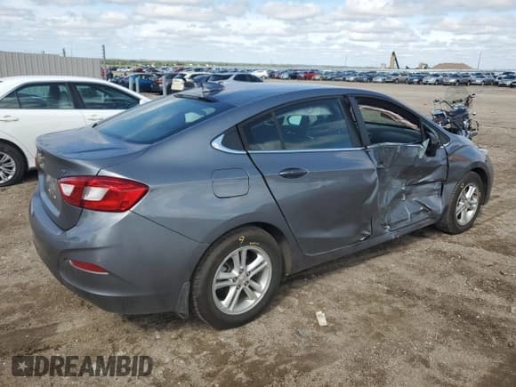 ✅ 2018 Chevrolet Cruze LT • VIN: 1G1BE5SM6J7167293 • Lot: 80909685. Listed on Copart with 39,452 mi. Free auction sales archive from the USA and detailed vehicle history report at DreamBid. Image 3.