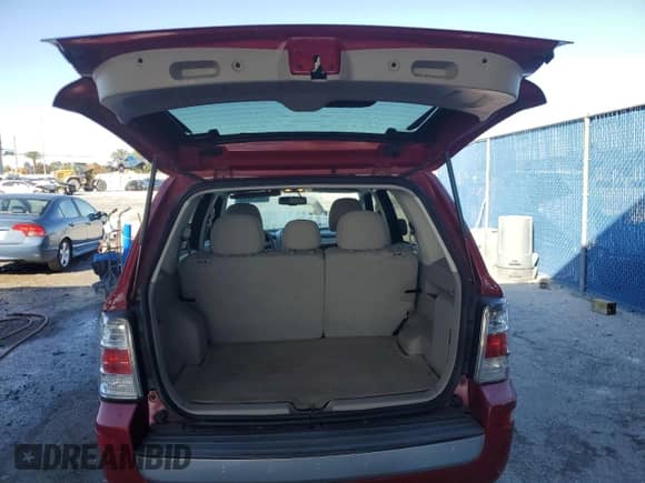 2011 Mercury Mariner z VIN 4M2CN8B72BKJ04014, wystawiony jako Copart lot #44919685 z przebiegiem 101 063 mil mil oraz Szkoda całkowita • Salvage title. Historia ofert i sprzedaży dostępna na DreamBid. Obrazek 6.