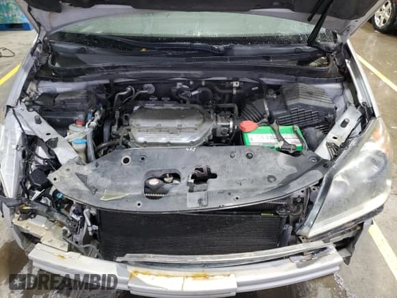 ✅ 2009 Honda Odyssey EX-L • VIN: 5FNRL38709B055418 • Лот: 90545395. Опубликован ранее на Copart с пробегом 179 711 миль. Бесплатный доступ к архиву аукционных продаж из США и подробный отчёт об истории автомобиля на DreamBid. Изображение 12.