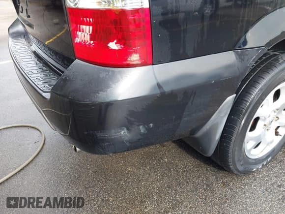 ✅ 2002 Acura MDX Touring • VIN: 2HNYD18622H500465 • Lot: 42360030. Listed on IAAI with 227,026 mi. Free auction sales archive from the USA and detailed vehicle history report at DreamBid. Image 12.