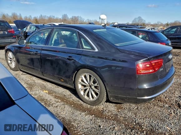 ✅ 2014 Audi A8 3.0L TDI • VIN: WAURMAFD3EN000948 • Lot: 94907245. Wystawiony na Copart z przebiegiem 211 874 mil. Bezpłatny archiwum sprzedaży aukcyjnych z USA i szczegółowy raport historii pojazdu na DreamBid. Zdjęcie 2.