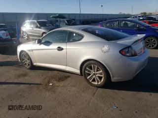 2008 Hyundai Tiburon GS с VIN KMHHM66D48U293082, выставлен на аукционе Copart как лот 64401385 с пробегом 71 163 миль миль и Списание • Salvage title. История ставок и продаж доступна на DreamBid. Изображение 2.