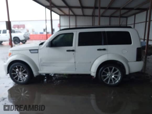 2008 Dodge Nitro R/T with VIN 1D8GT58638W218746, listed as a IAAI auction lot 42200153 with 186,676 mi miles and . Bid and sale history available at DreamBid. Image 14.