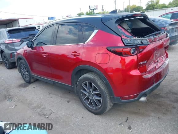 ✅ 2018 Mazda CX-5 Grand Touring • VIN: JM3KFADM3J1394722 • Lot: 43053904. Listed on IAAI with 111,491 mi. Free auction sales archive from the USA and detailed vehicle history report at DreamBid. Image 3.