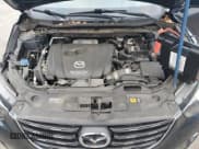 ✅ 2016 Mazda CX-5 Grand Touring • VIN: JM3KE4DY7G0859184 • Lot: 92858065. Wystawiony na Copart z przebiegiem 45 518 mil. Bezpłatny archiwum sprzedaży aukcyjnych z USA i szczegółowy raport historii pojazdu na DreamBid. Zdjęcie 11.