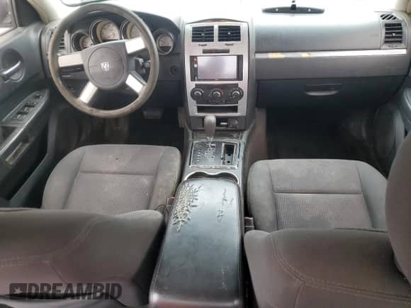 2010 Dodge Charger с VIN 2B3CA4CD3AH299966, выставлен на аукционе Copart как лот 77681734 с пробегом 179 861 миль миль и Чистый • Clean title. История ставок и продаж доступна на DreamBid. Изображение 8.