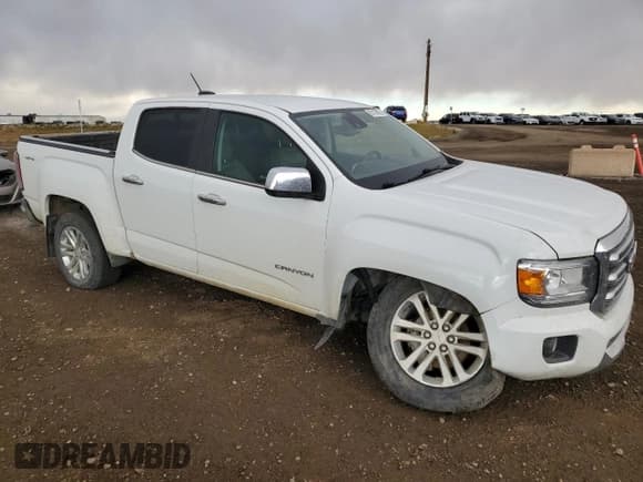 ✅ 2017 GMC Canyon 4WD SLT • VIN: 1GTG6DEN9H1315071 • Lot: 85130695. Listed on Copart with 111,299 mi. Free auction sales archive from the USA and detailed vehicle history report at DreamBid. Image 4.