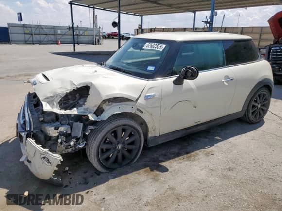 2015 MINI Hardtop S with VIN WMWXP7C56F2A58203, listed as a Copart auction lot 62602855 with 101,679 mi miles and Salvage title. Bid and sale history available at DreamBid. Image 1.