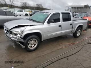 2002 Dodge Dakota SLT z VIN 1B7HL48X72S584617, wystawiony jako Copart lot #86504284 z przebiegiem 236 216 mil mil oraz Szkoda całkowita • Salvage title. Historia ofert i sprzedaży dostępna na DreamBid. Obrazek 1.
