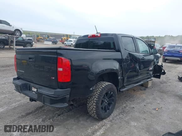 ✅ 2021 Chevrolet Colorado 4WD Z71 • VIN: 1GCGTDENXM1105680 • Lot: 42341543. Listed on IAAI with 85,311 mi. Free auction sales archive from the USA and detailed vehicle history report at DreamBid. Image 4.