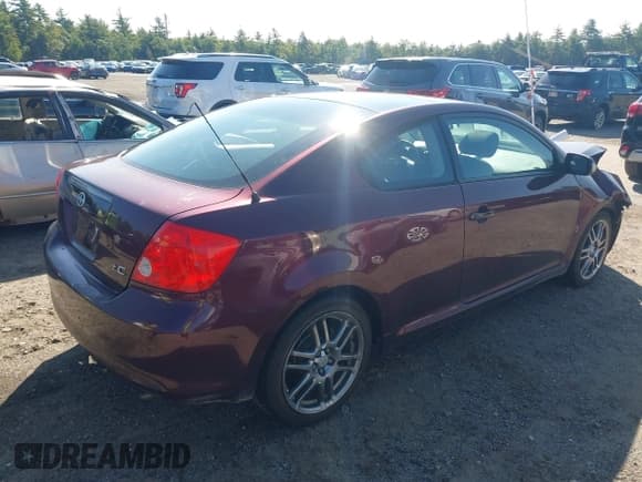 ✅ 2006 Scion tC • VIN: JTKDE177360077099 • Лот: 43173685. Опубликован ранее на IAAI с пробегом 169 215 миль. Бесплатный доступ к архиву аукционных продаж из США и подробный отчёт об истории автомобиля на DreamBid. Изображение 4.