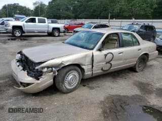 ✅ 1998 Ford Crown Victoria • VIN: 2FAFP73W0WX162676 • Lot: 71668134. Listed on Copart with 106,167 mi. Free auction sales archive from the USA and detailed vehicle history report at DreamBid. Image 1.