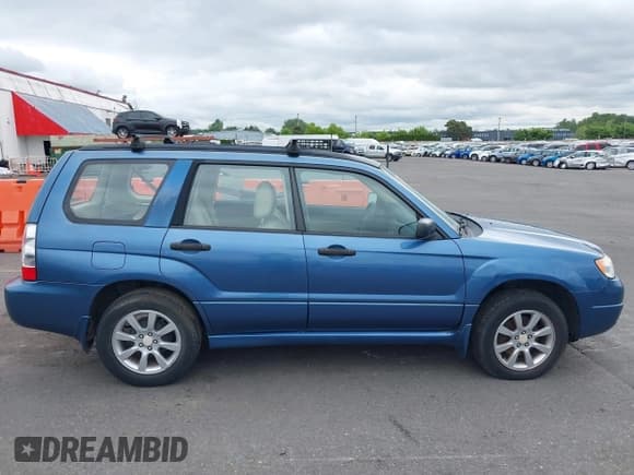 ✅ 2007 Subaru Forester X • VIN: JF1SG63657G743039 • Lot: 42136531. Listed on IAAI with 129,731 mi. Free auction sales archive from the USA and detailed vehicle history report at DreamBid. Image 12.